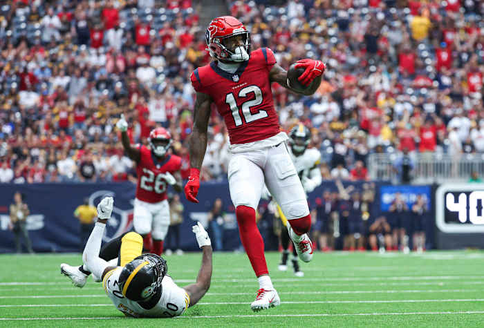 Texans Nico Collins scores a touchdown.
